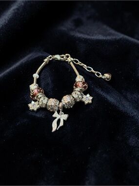 Silver Charm Bracelet with Burgundy Beads and Crystal Accents